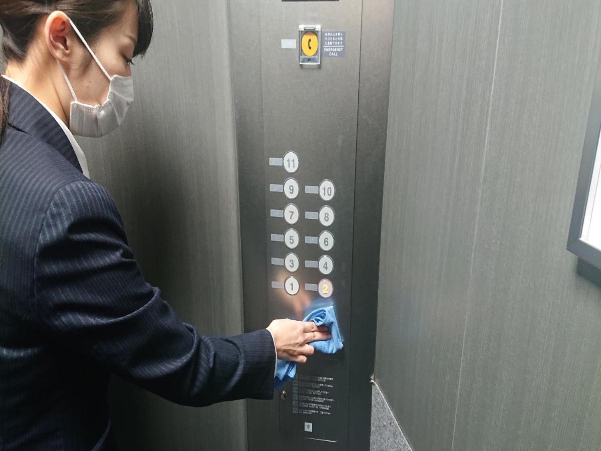 高冈站前微笑酒店 外观 照片