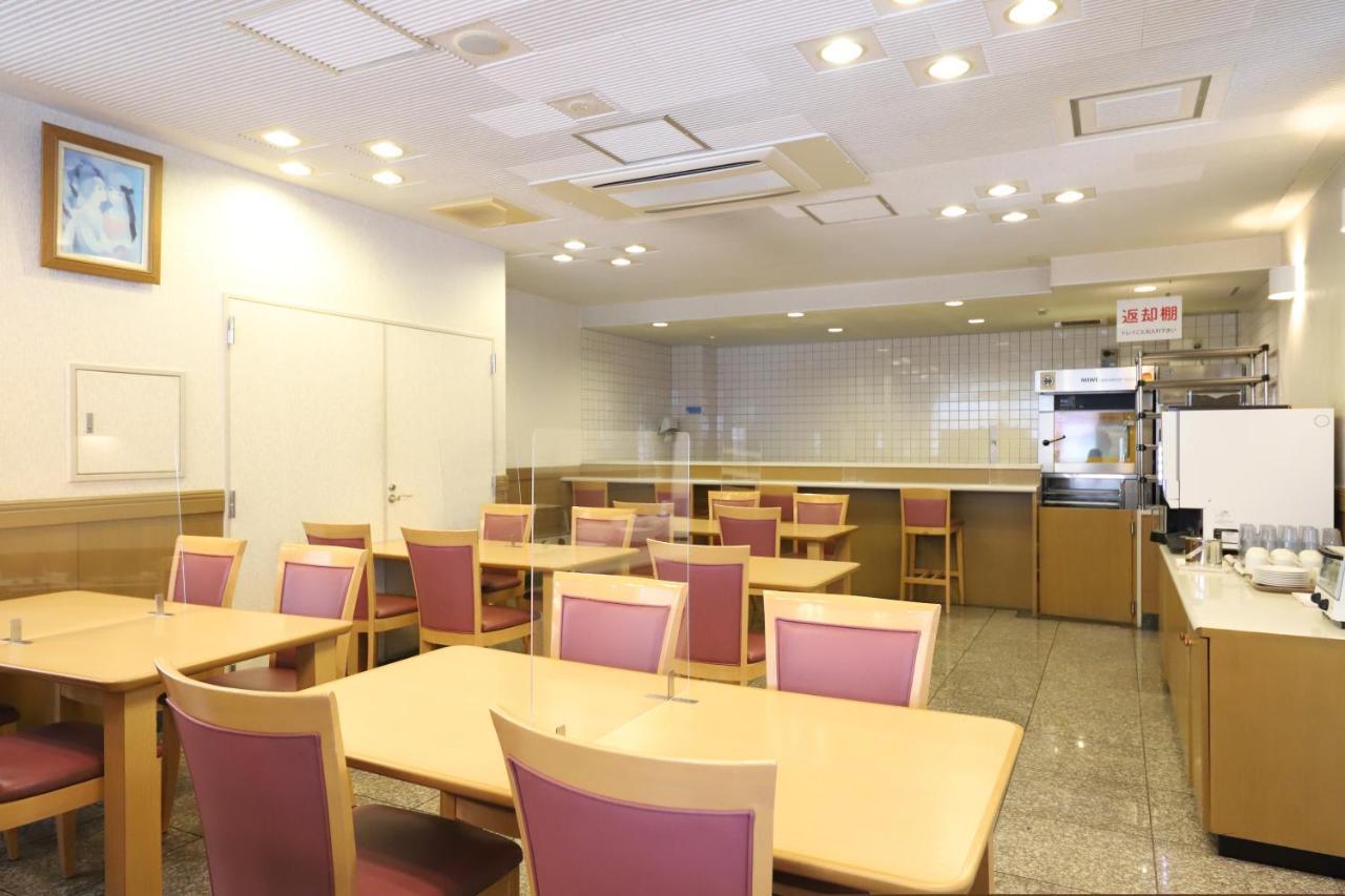 高冈站前微笑酒店 外观 照片